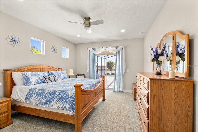 bedroom with access to exterior, baseboards, ceiling fan, light colored carpet, and recessed lighting