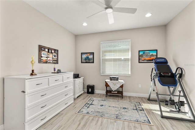 workout room featuring recessed lighting, baseboards, ceiling fan, and light wood finished floors