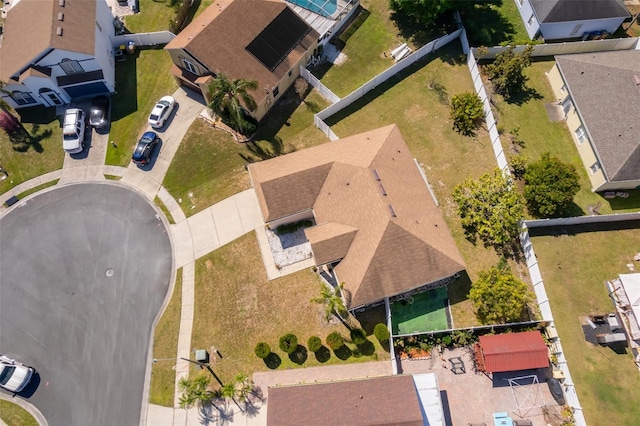 birds eye view of property with a residential view