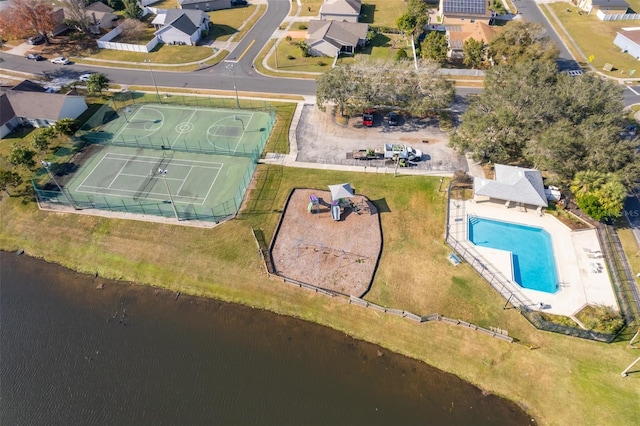 birds eye view of property featuring a water view