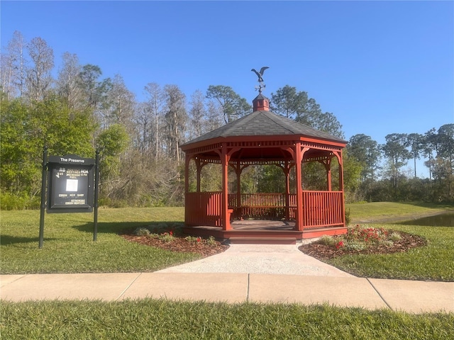 view of home's community with a gazebo and a yard