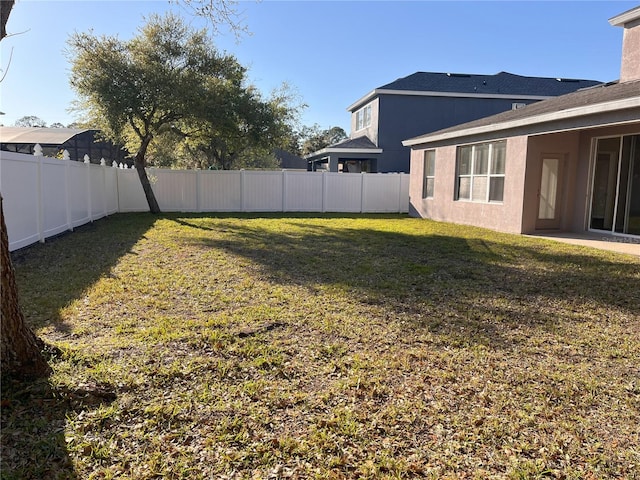 view of yard featuring a fenced backyard