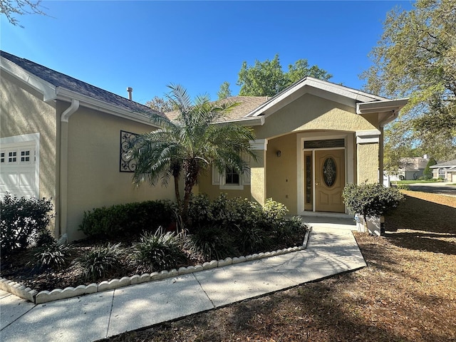 view of front facade featuring stucco siding