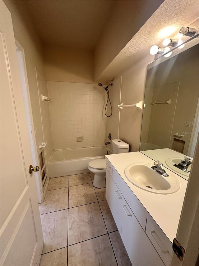 full bathroom with vanity, shower / tub combination, and toilet