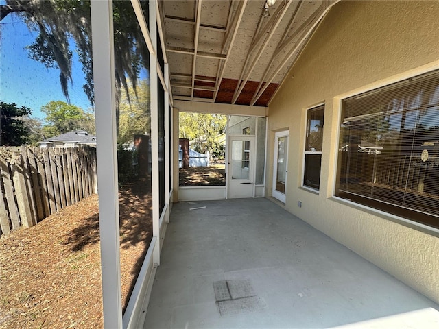 view of patio featuring fence