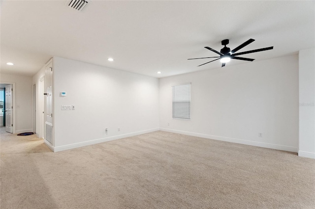 unfurnished room with recessed lighting, visible vents, light colored carpet, and ceiling fan