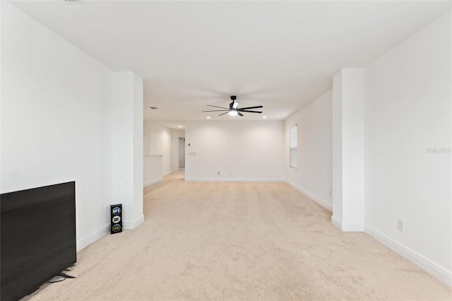 spare room featuring recessed lighting, light colored carpet, baseboards, and ceiling fan