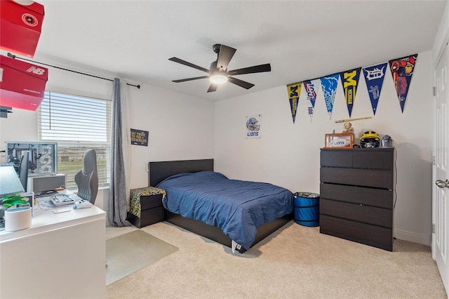 bedroom featuring carpet flooring and a ceiling fan