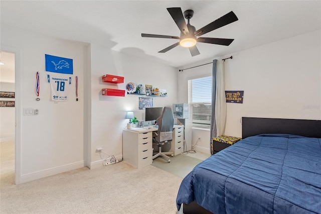 bedroom featuring a ceiling fan, baseboards, and carpet floors