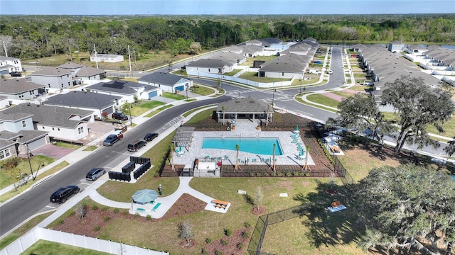 aerial view with a residential view and a wooded view