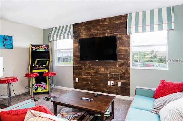 living room with carpet flooring and baseboards