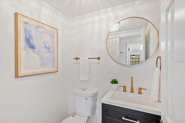 half bath with toilet and vanity