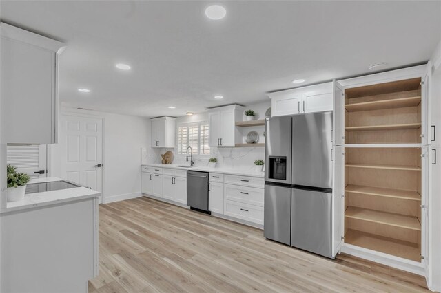 116 E Cottesmore Cir, Longwood, FL 32779 - kitchen featuring light wood-style flooring, recessed lighting, appliances with stainless steel finishes, white cabinetry, and open shelves