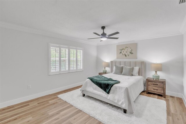 116 E Cottesmore Cir, Longwood, FL 32779 - bedroom with baseboards, light wood-style flooring, and crown molding