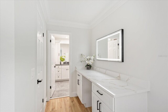 116 E Cottesmore Cir, Longwood, FL 32779 - hallway featuring light wood-type flooring and crown molding