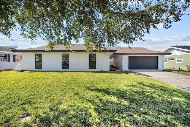 607 Dunblane Dr, Winter Park, FL 32792 - ranch-style house with a front yard, a garage, and driveway