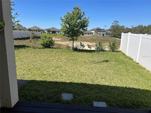 view of yard with fence