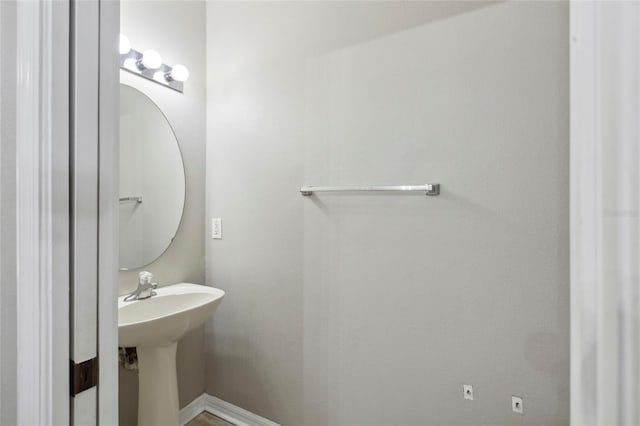 bathroom featuring baseboards