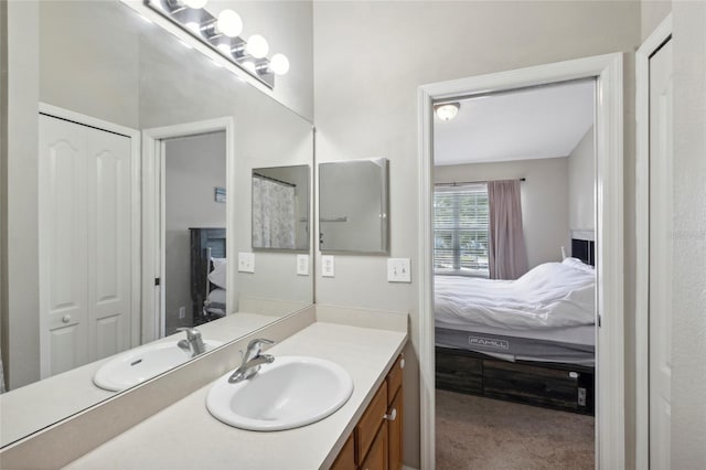 ensuite bathroom featuring vanity and ensuite bath