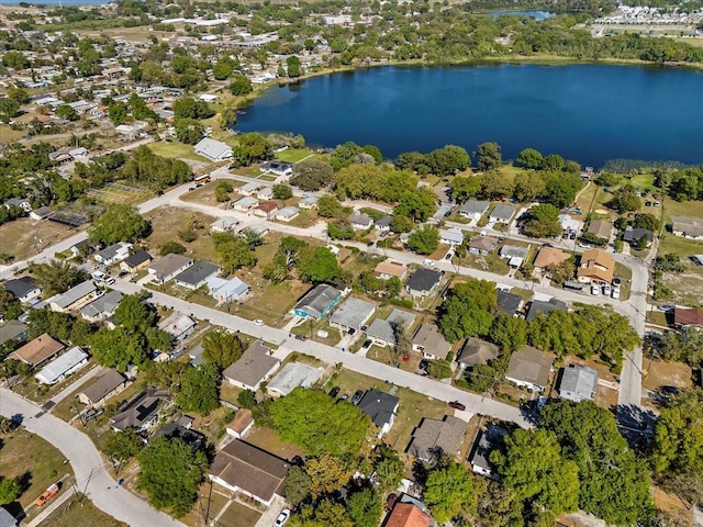 birds eye view of property with a residential view and a water view