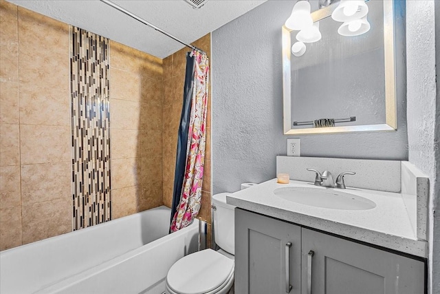 full bath with shower / bathtub combination with curtain, toilet, vanity, and a textured wall