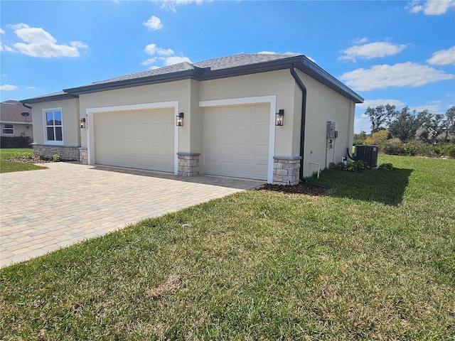 view of side of home with stucco siding, driveway, stone siding, cooling unit, and a garage