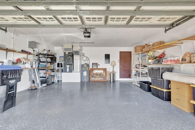 garage featuring electric panel, a garage door opener, and water heater