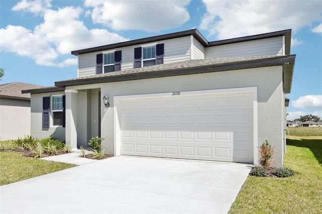 traditional-style home with stucco siding, driveway, and a garage