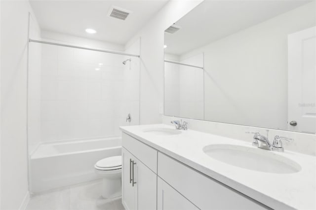 full bathroom with double vanity, visible vents, toilet, and a sink