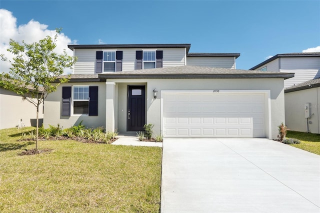 view of front of home with stucco siding, concrete driveway, a front lawn, and a garage