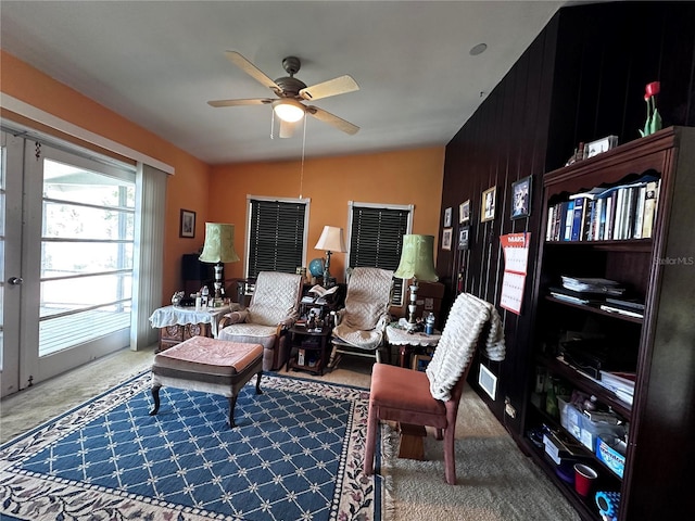 office featuring lofted ceiling, ceiling fan, and carpet flooring