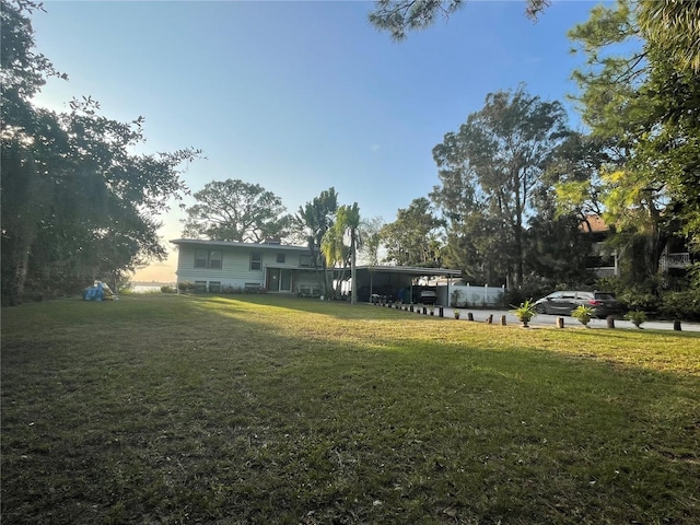 view of yard with a carport