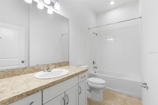 full bath with tile patterned flooring, toilet, vanity, and bathing tub / shower combination