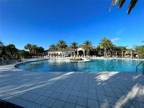 community pool with a patio