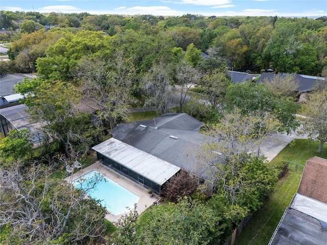 drone / aerial view with a view of trees