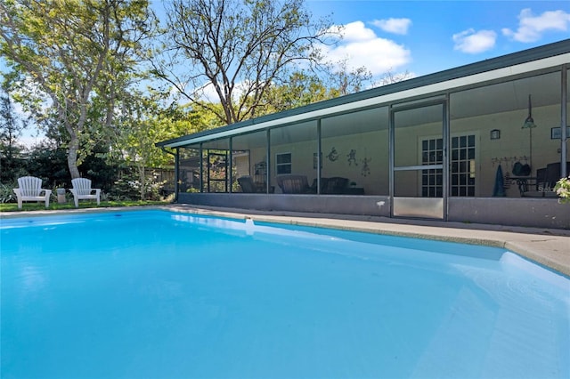 pool with a sunroom