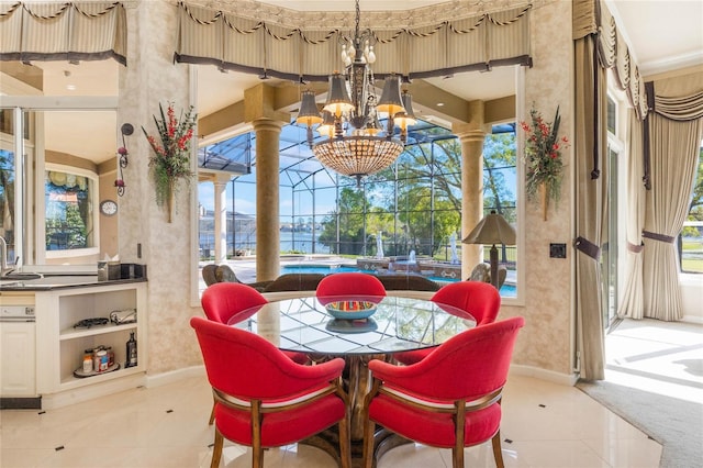 dining room featuring light tile patterned floors and a chandelier