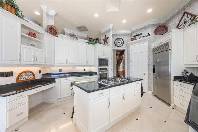 kitchen with open shelves, built in appliances, crown molding, and light tile patterned floors