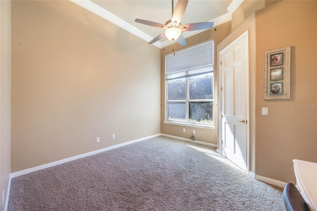 interior space with ceiling fan, crown molding, and baseboards