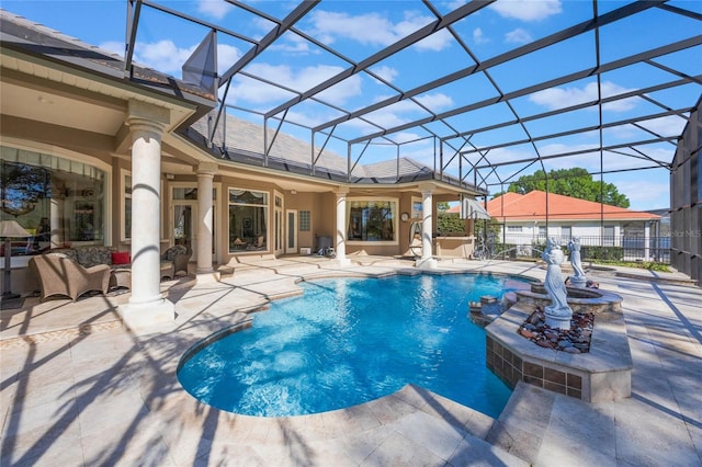 view of pool with a patio area, a fenced in pool, glass enclosure, and fence