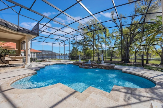 view of swimming pool with a lanai, a pool with connected hot tub, and a patio