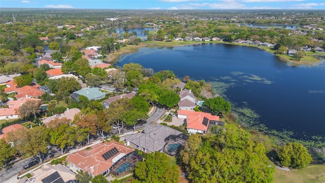 bird's eye view featuring a residential view and a water view