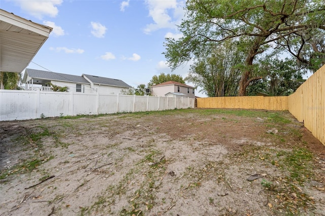 view of yard featuring a fenced backyard