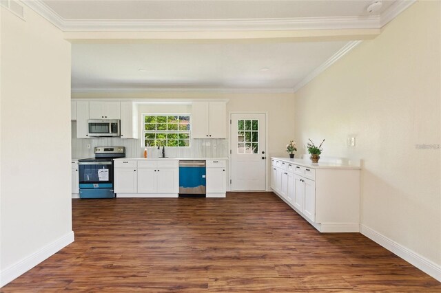 kitchen with visible vents, appliances with stainless steel finishes, dark wood-style floors, and crown molding