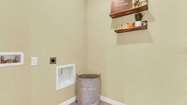 laundry room featuring electric dryer hookup, baseboards, hookup for a washing machine, and laundry area