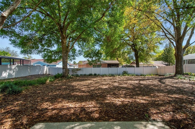 view of yard with fence