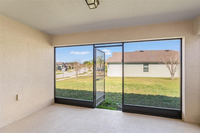 view of unfurnished sunroom