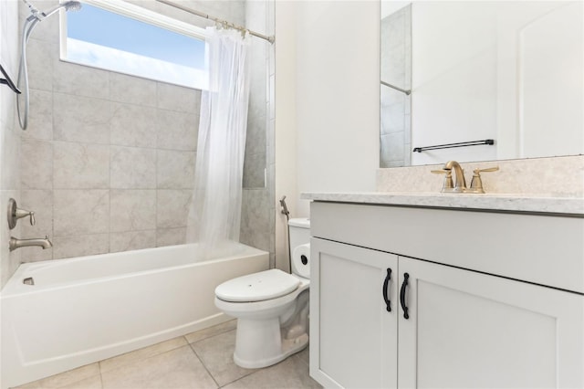 full bath with vanity, tile patterned floors, toilet, and shower / bath combo with shower curtain