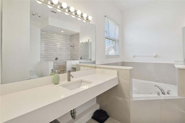 bathroom featuring visible vents, a walk in shower, toilet, a tub with jets, and vanity