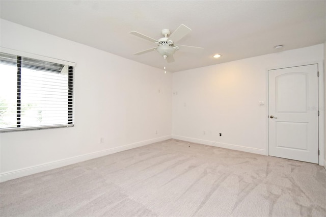 unfurnished room featuring recessed lighting, baseboards, light colored carpet, and a ceiling fan